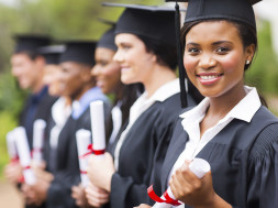 pretty african female college graduate at graduation